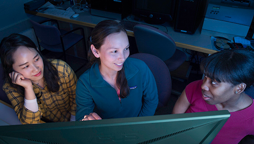students collaborating in the lab